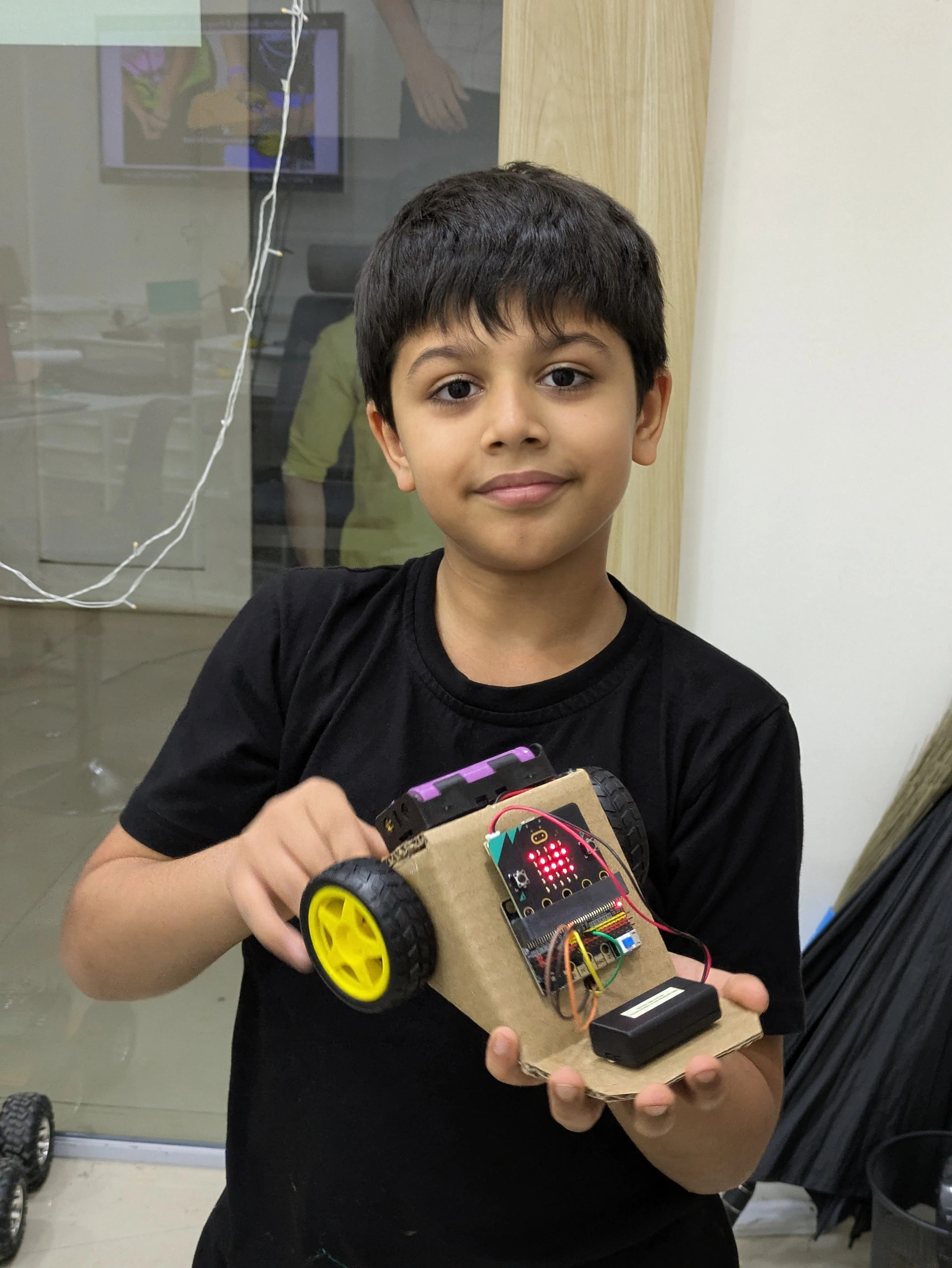 Student showing a project